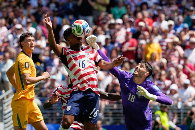 US reaches World Cup knockout round and wins its group with 2nd straight victory, 2-0 over Australia